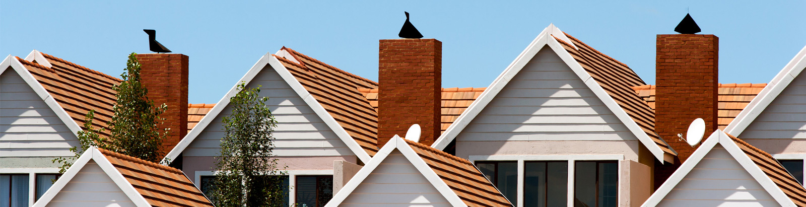 Brown tiled roofs with chimney