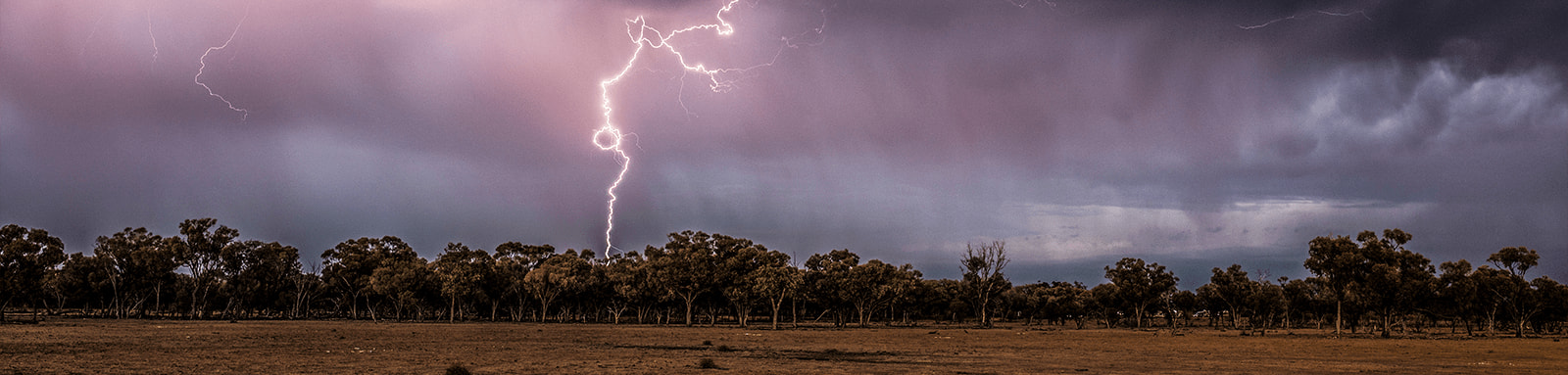 Lightning strike in country landscape
