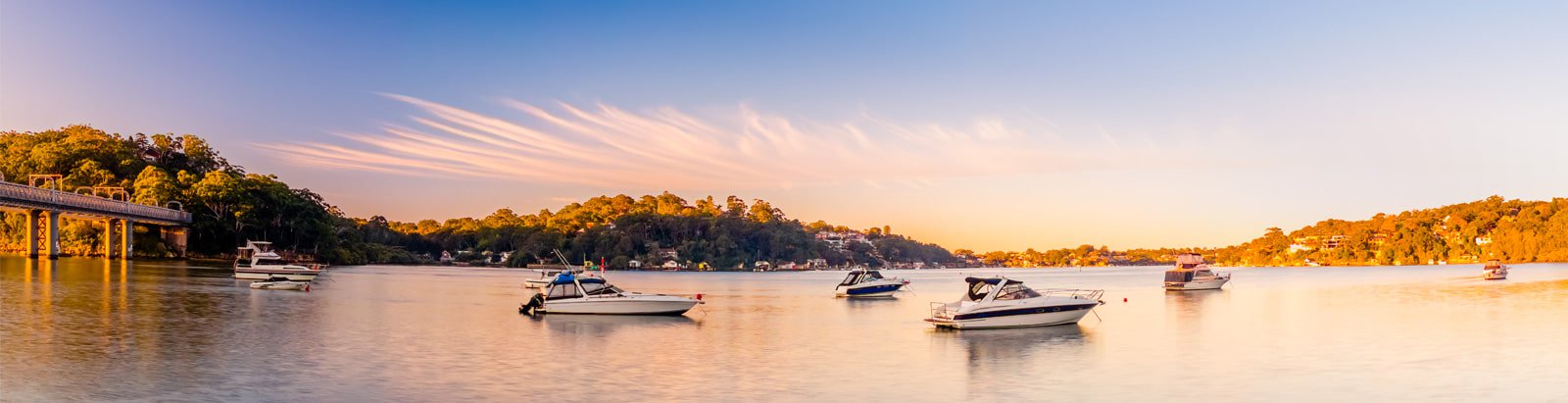 Sunset view of bay with boats