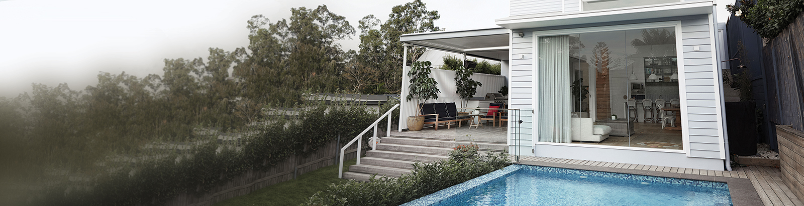 Weatherboard house with backyard pool