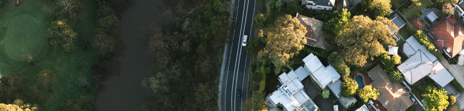 Aerial image of bush meeting edge of city