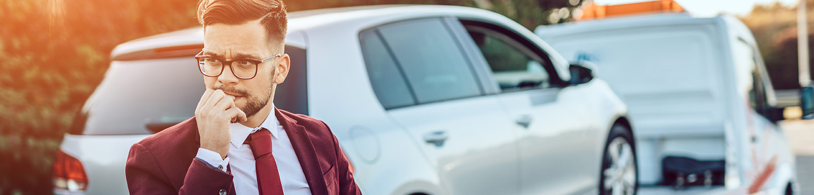 Business man using towing service