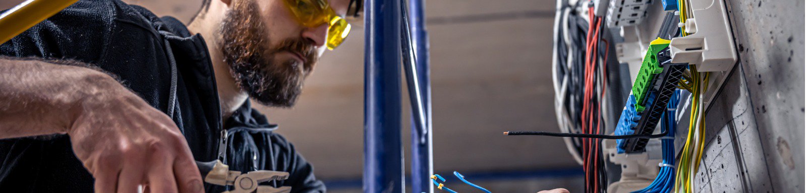 Electrician working on a switchboard