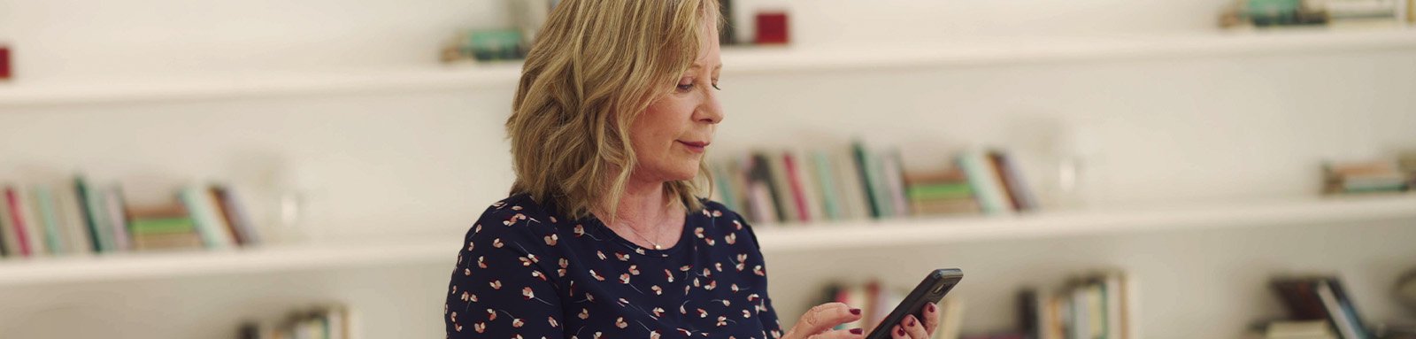 Woman using her smartphone phone