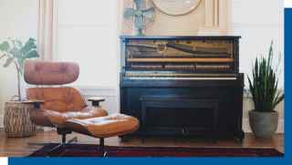 Reclining chair with upright piano